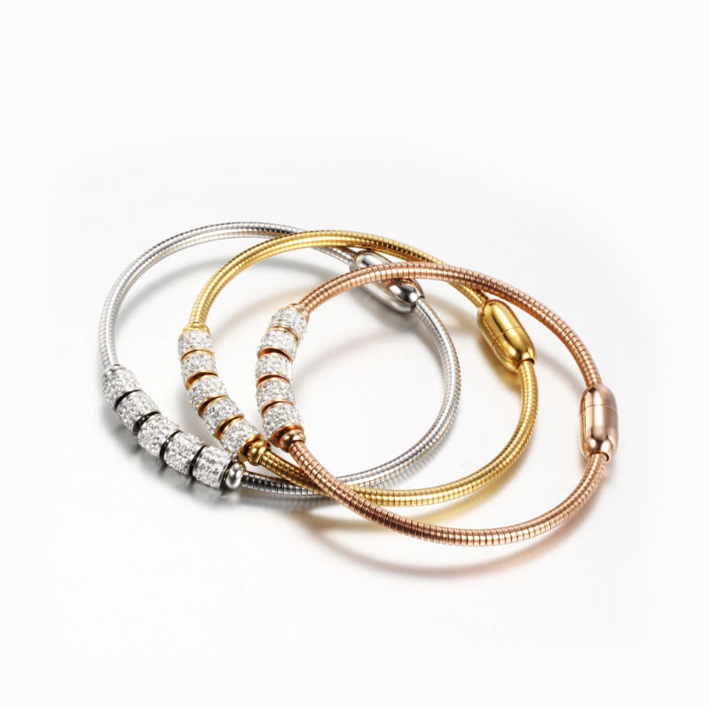 Armreife aus Edelstahl mit Zylinderanhänger und Strasssteinen