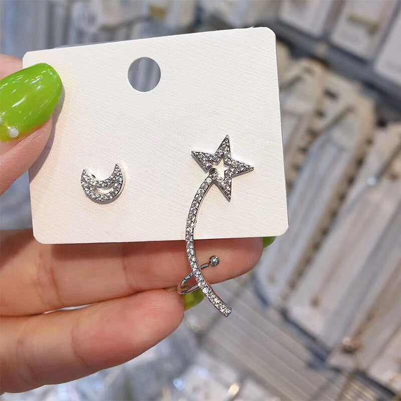 Mit Strasssteinen besetzte, skurrile Engelsflügel-Ohrhänger-Kollektion