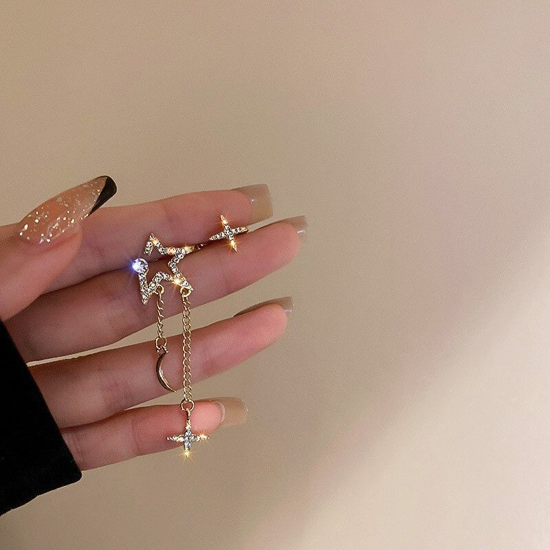 Mit Strasssteinen besetzte, skurrile Engelsflügel-Ohrhänger-Kollektion