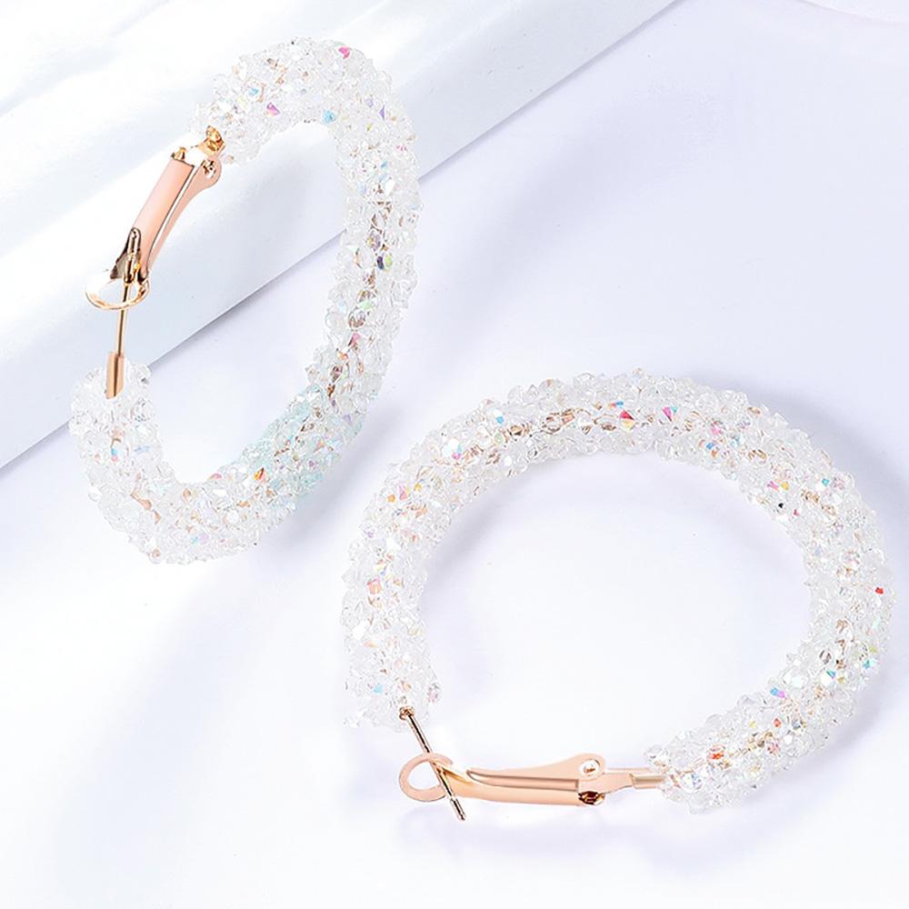 Runde schillernde baumelnde Ohrringe