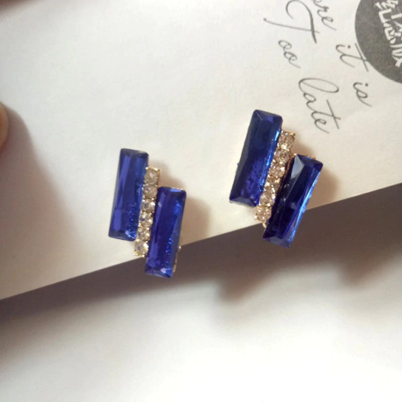 Königliche und elegante blaue Ohrclips mit Schleife