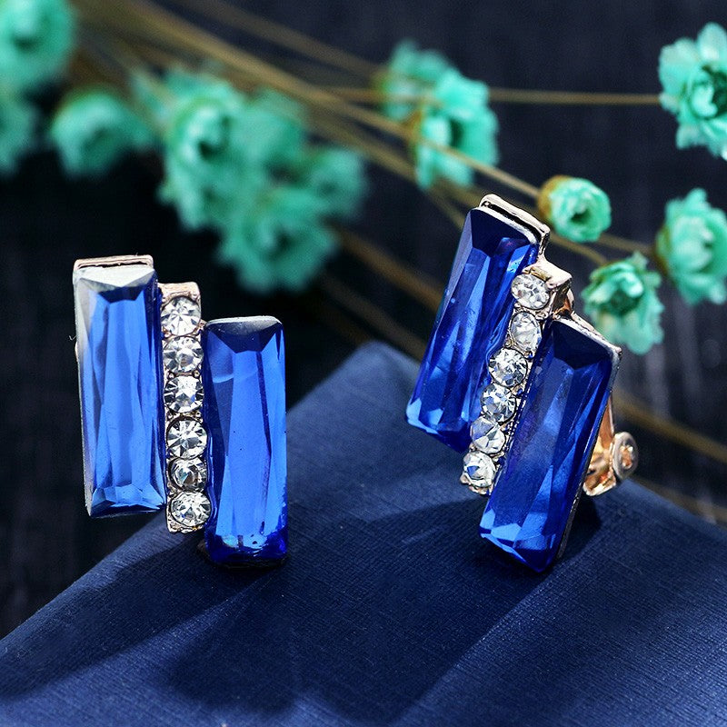 Königliche und elegante blaue Ohrclips mit Schleife