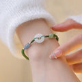 Verstellbares grünes Jadearmband - Jadeschmuck, Kreisanhänger, geknotete Schnur