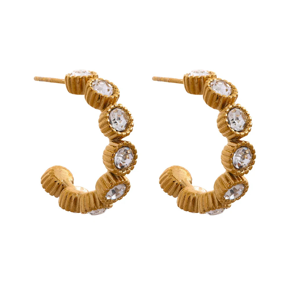 Halbe Creolen mit Steinen