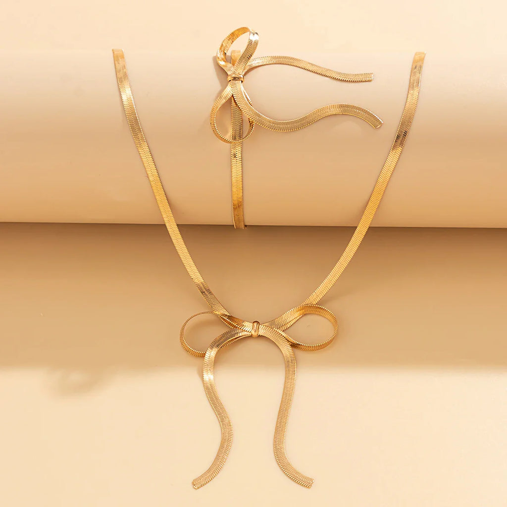 Set aus Halskette und Armband mit Schleife