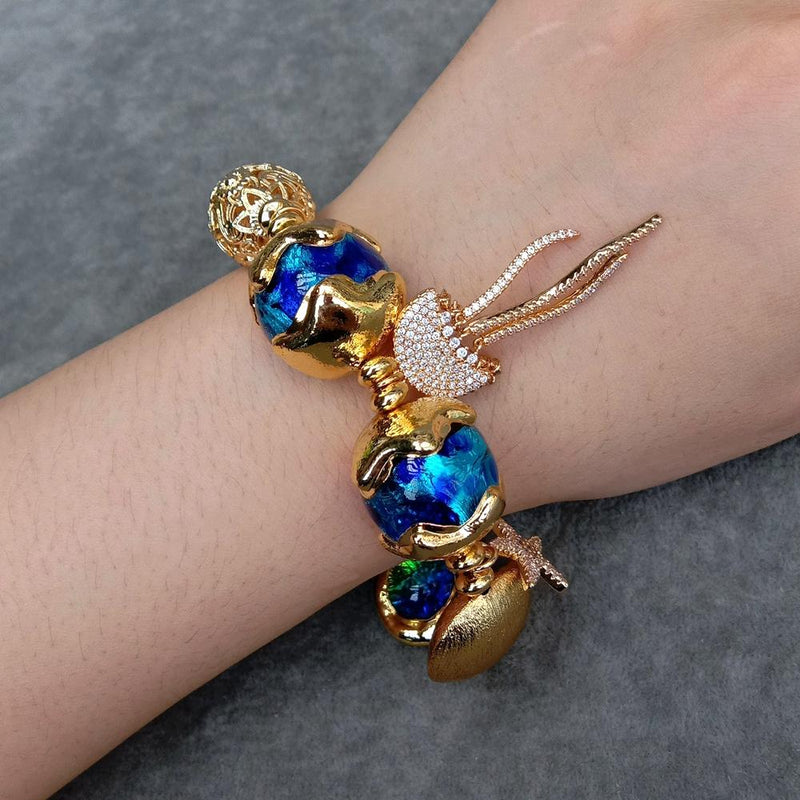 Blaues Muranoglas vergoldetes Quallenarmband
