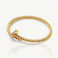 Armband mit goldenen Perlen