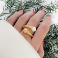 Offener Ring mit gedrehten Perlen