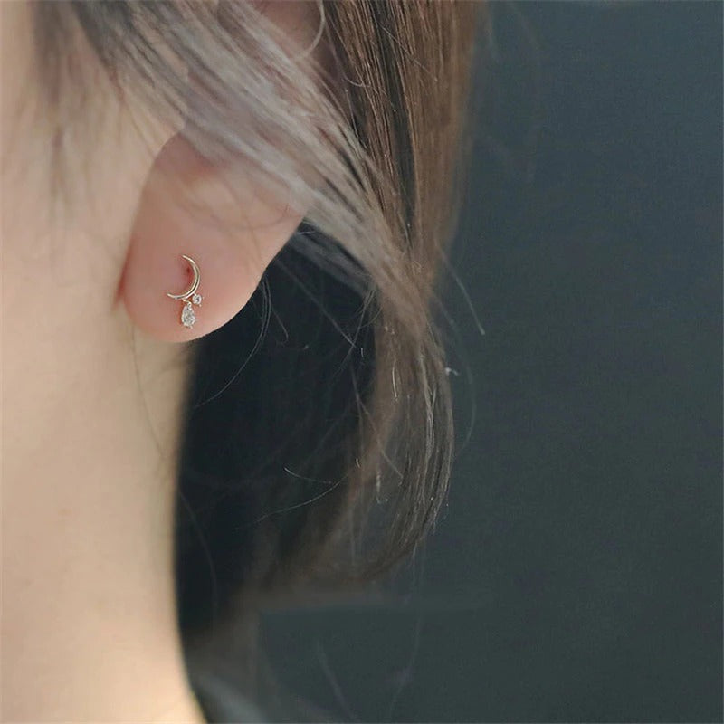 Schimmernde Halbmond-Quasten-Zirkon-Ohrringe