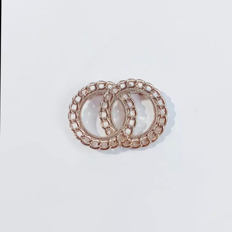 Schimmernde, mit Strasssteinen besetzte Broschennadeln mit Quasten und Perlen