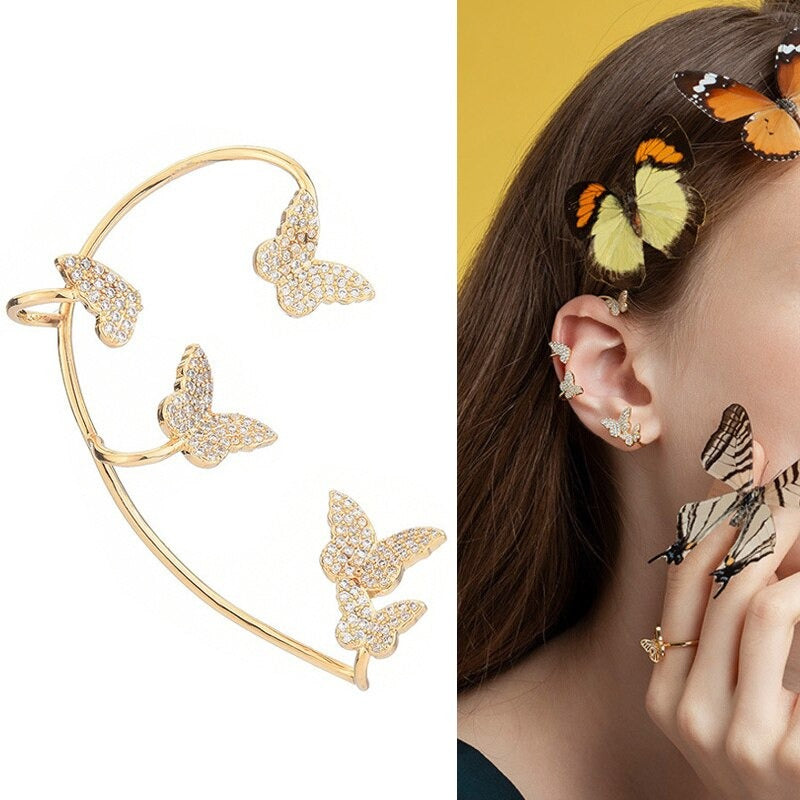 Glänzende, mit Strasssteinen besetzte, lange Quastenohrringe mit Knorpelmanschette