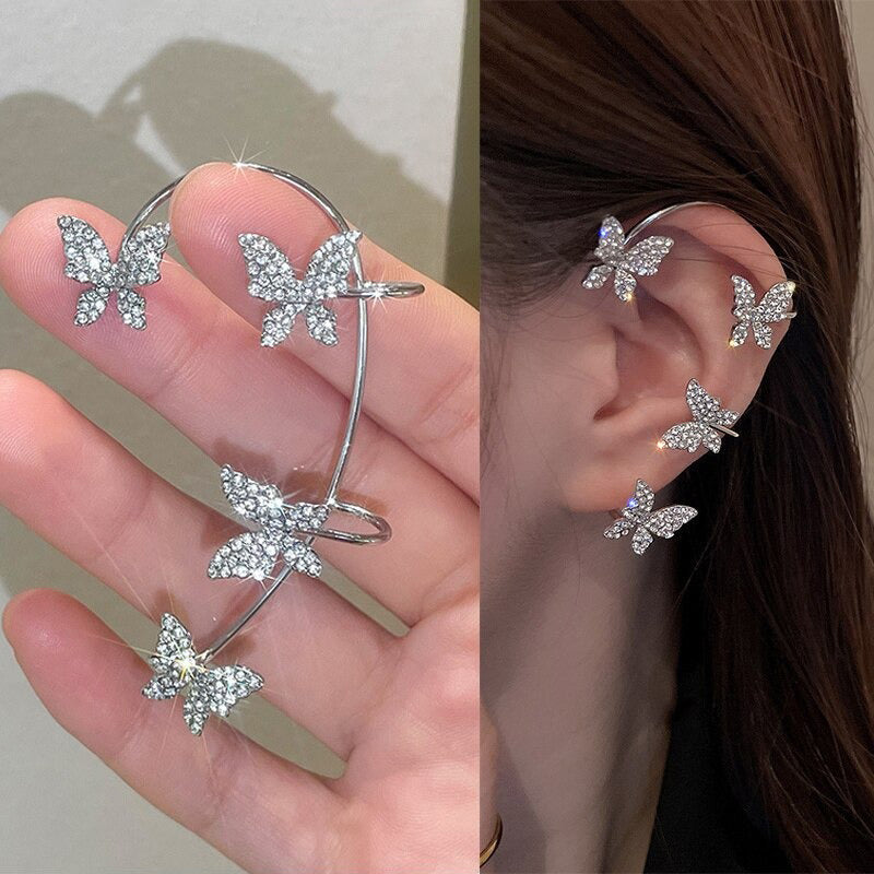 Glänzende, mit Strasssteinen besetzte, lange Quastenohrringe mit Knorpelmanschette