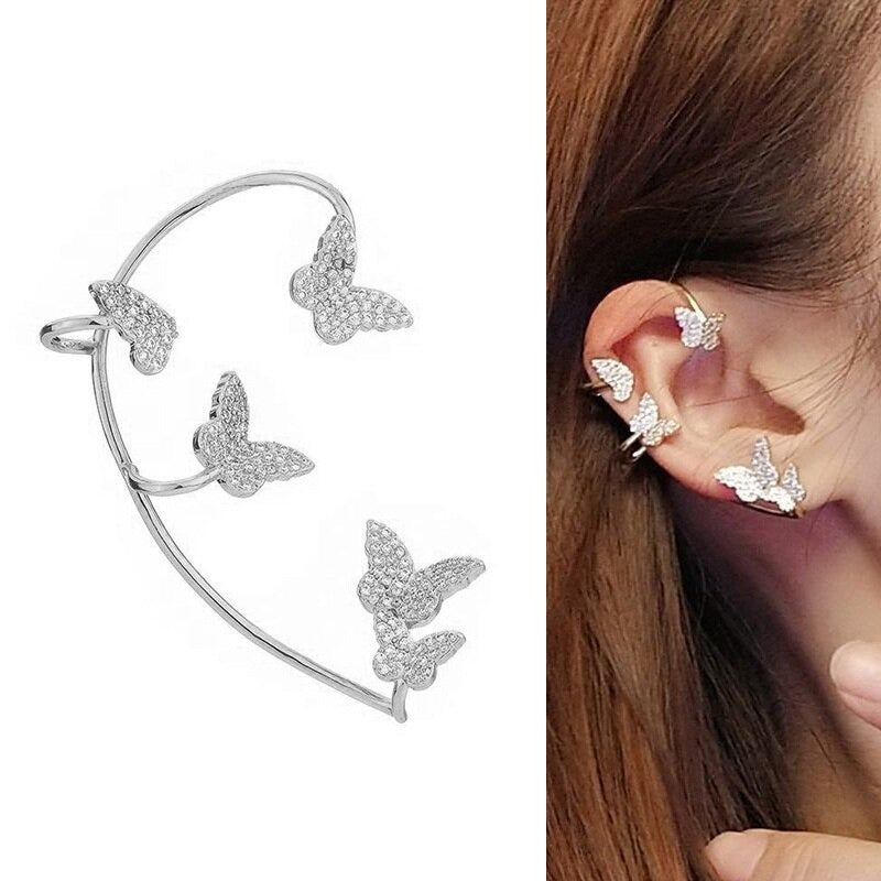 Glänzende, mit Strasssteinen besetzte, lange Quastenohrringe mit Knorpelmanschette