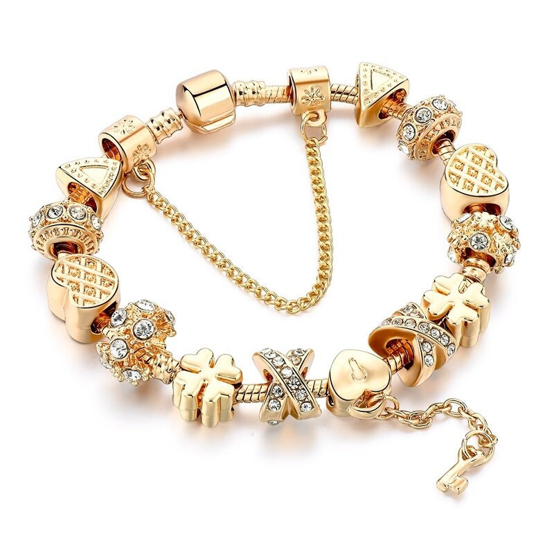 Anspruchsvolle, mit Gold besetzte Armbänder mit Herzanhängern