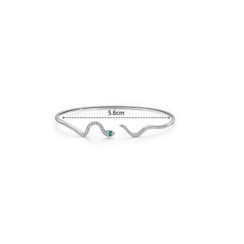 Funkelnde, mit Zirkonia akzentuierte Armreife in Schlangenform