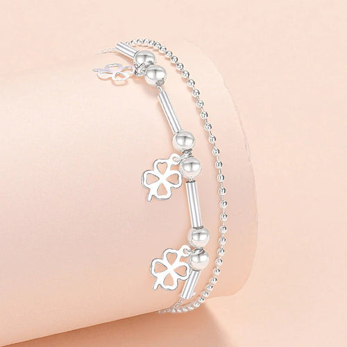 Armbandkollektion mit Schmetterlings- und Kreuz-Charms aus Sterlingsilber
