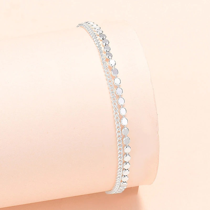 Armbandkollektion mit Schmetterlings- und Kreuz-Charms aus Sterlingsilber