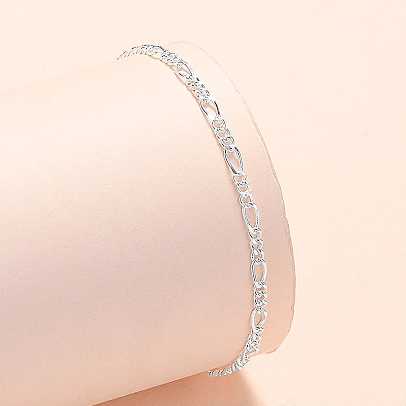 Armbandkollektion mit Schmetterlings- und Kreuz-Charms aus Sterlingsilber
