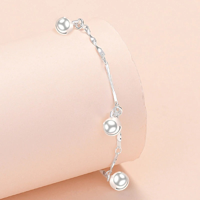 Armbandkollektion mit Schmetterlings- und Kreuz-Charms aus Sterlingsilber
