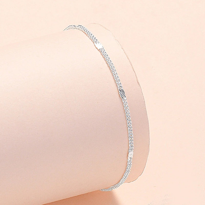Armbandkollektion mit Schmetterlings- und Kreuz-Charms aus Sterlingsilber