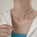 Süßes, modisches Perlenhalsband mit zarten Herzanhängern