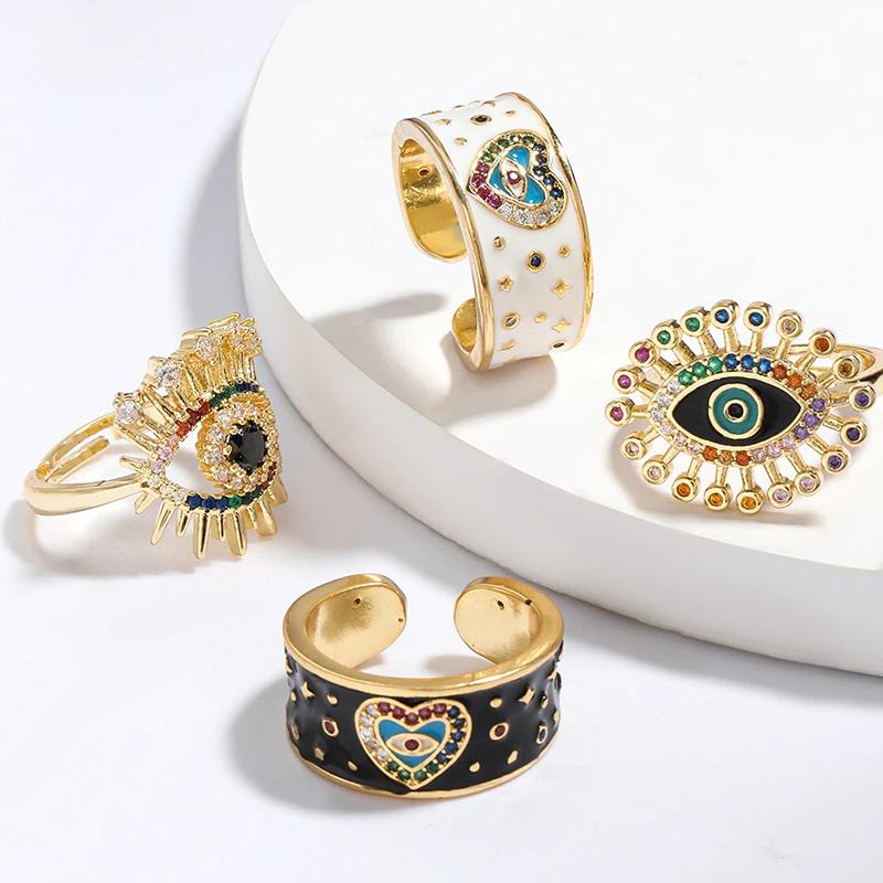 Trendy Hippie-Ringe mit bunten Strasssteinen und Glücksaugen