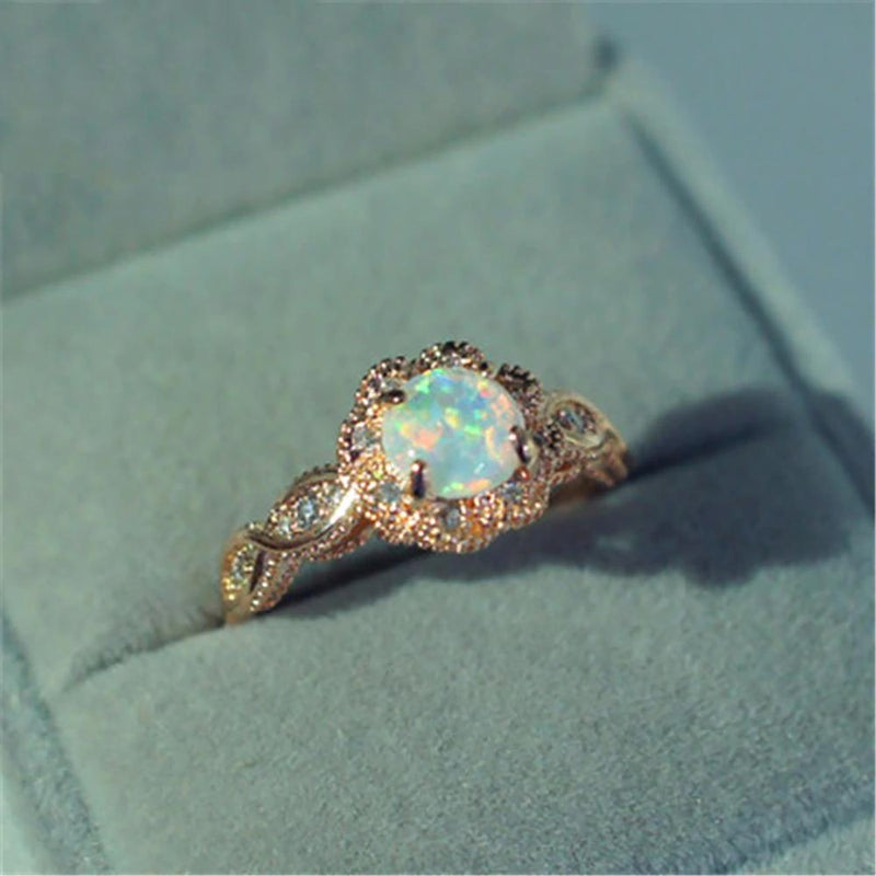 Lebendige Strassblume mit Feueropalring