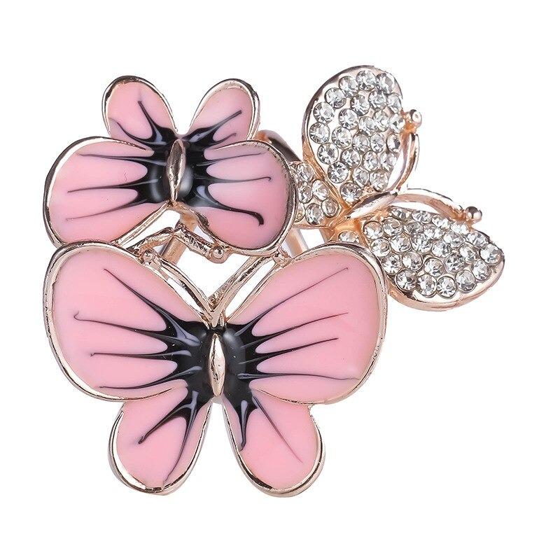 Leuchtender Schalschnallenring mit Strasssteinen und Perlen