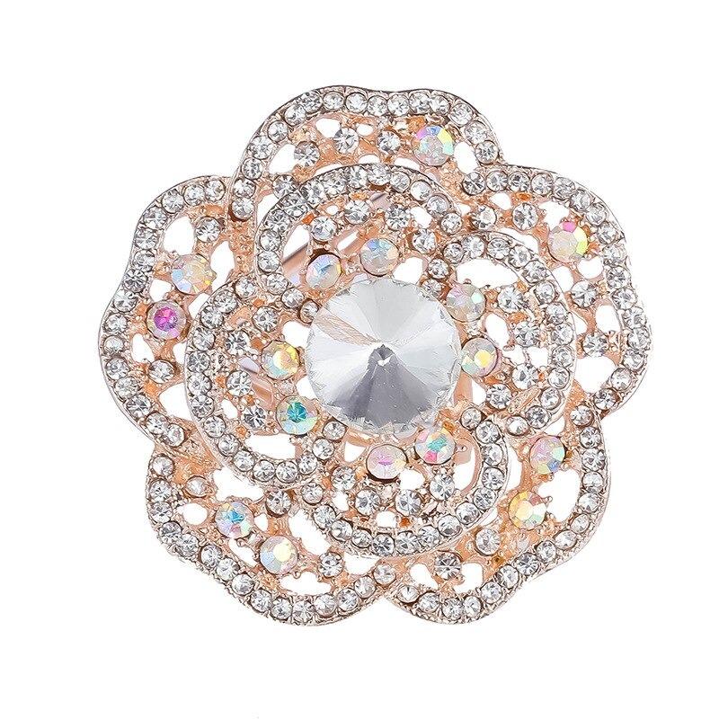 Leuchtender Schalschnallenring mit Strasssteinen und Perlen