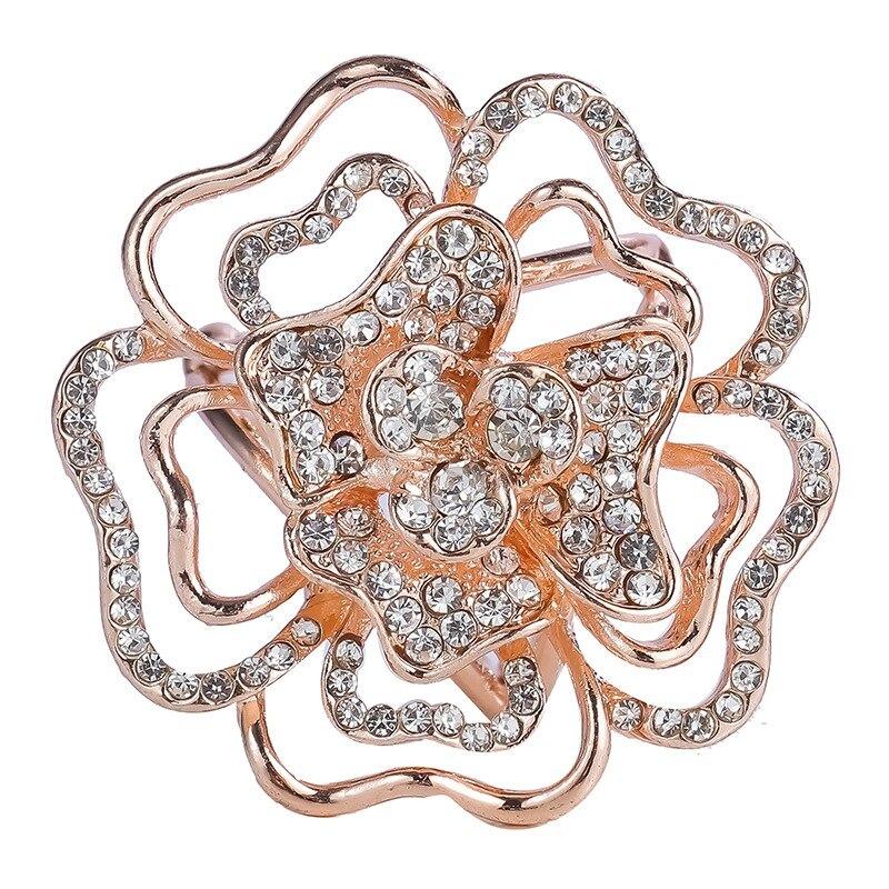 Leuchtender Schalschnallenring mit Strasssteinen und Perlen