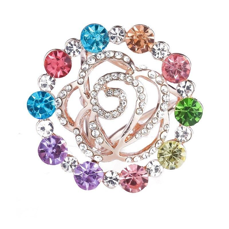 Leuchtender Schalschnallenring mit Strasssteinen und Perlen