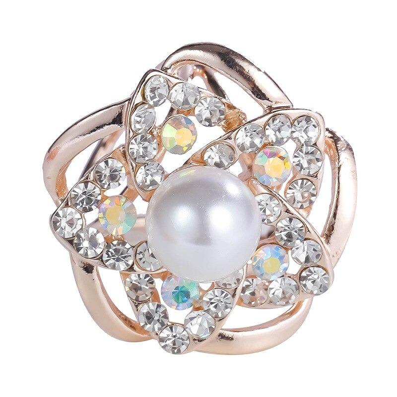 Leuchtender Schalschnallenring mit Strasssteinen und Perlen