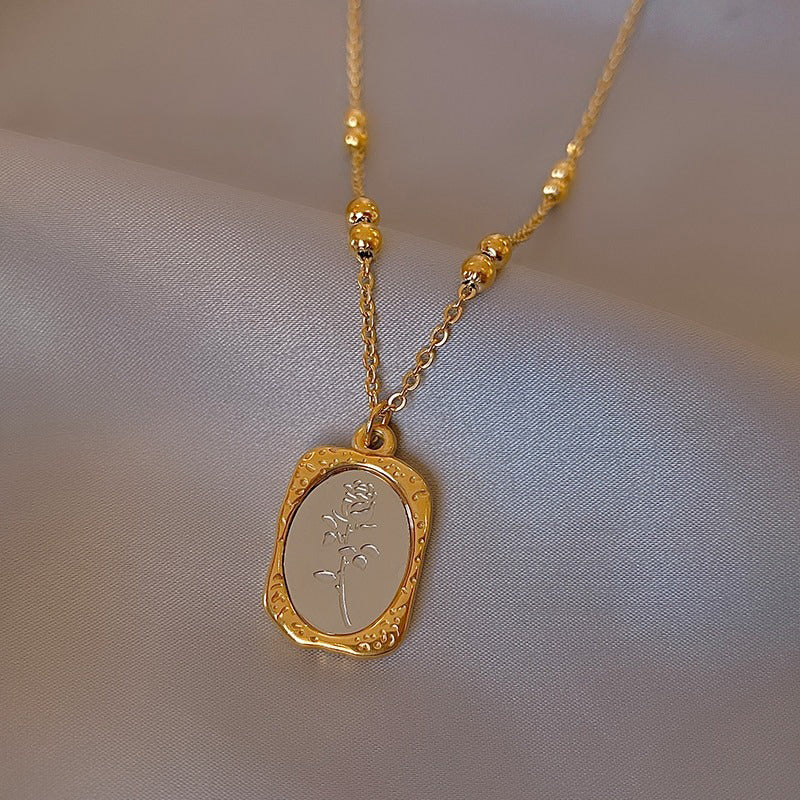 Halsketten aus Edelstahl mit Glasspiegel und Rosenblüten-Anhänger im Vintage-Stil