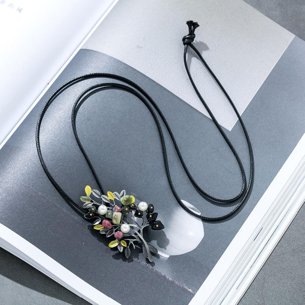 Halskette mit Broschenanhänger in Baumform im Vintage-Stil