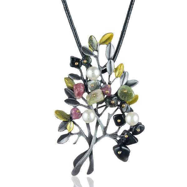 Halskette mit Broschenanhänger in Baumform im Vintage-Stil