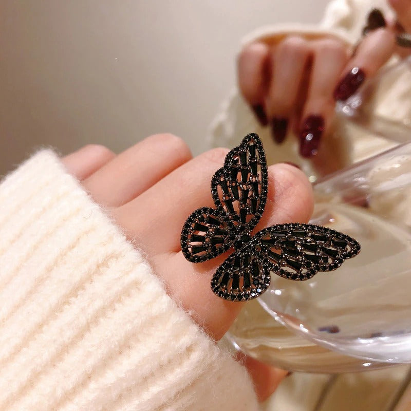 Wunderliche mit Zirkonen verzierte schwarze Schmetterlingsringe
