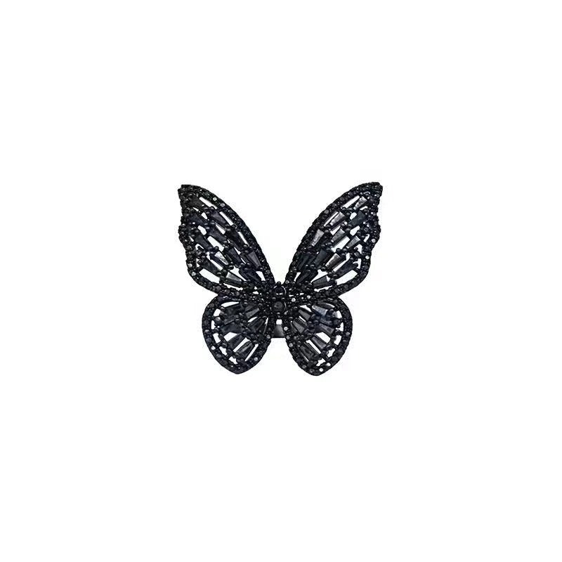 Wunderliche mit Zirkonen verzierte schwarze Schmetterlingsringe