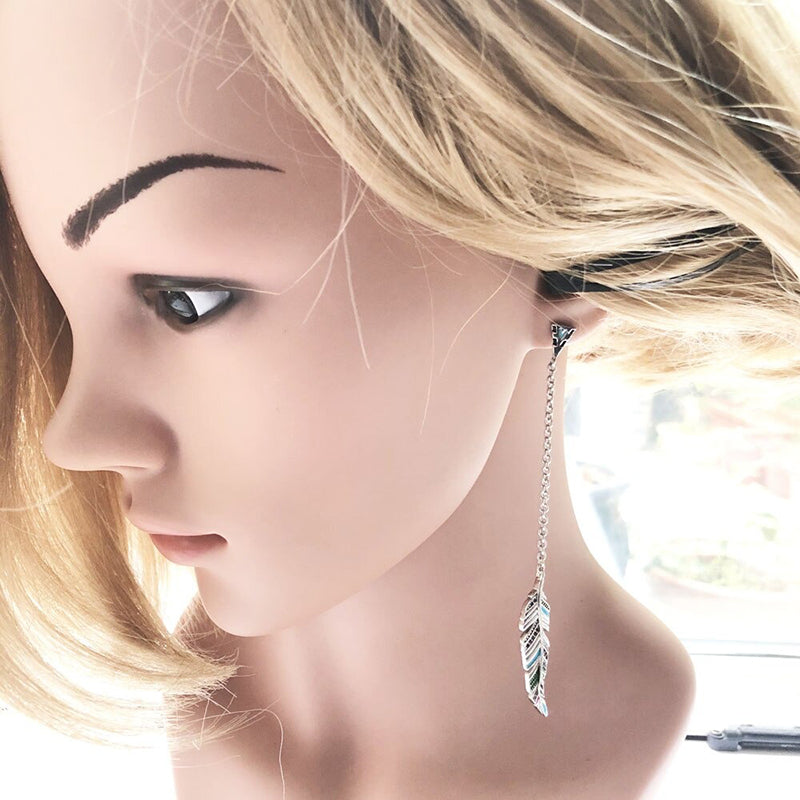 Böhmische Ohrringe mit langen Federquasten und Zirkonen