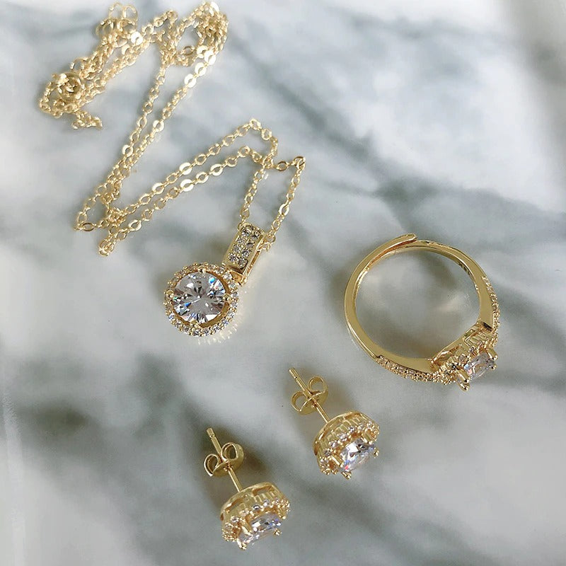 Mit Zirkonen verzierte Schmucksets aus Halskette, Ohrringen und Ringen