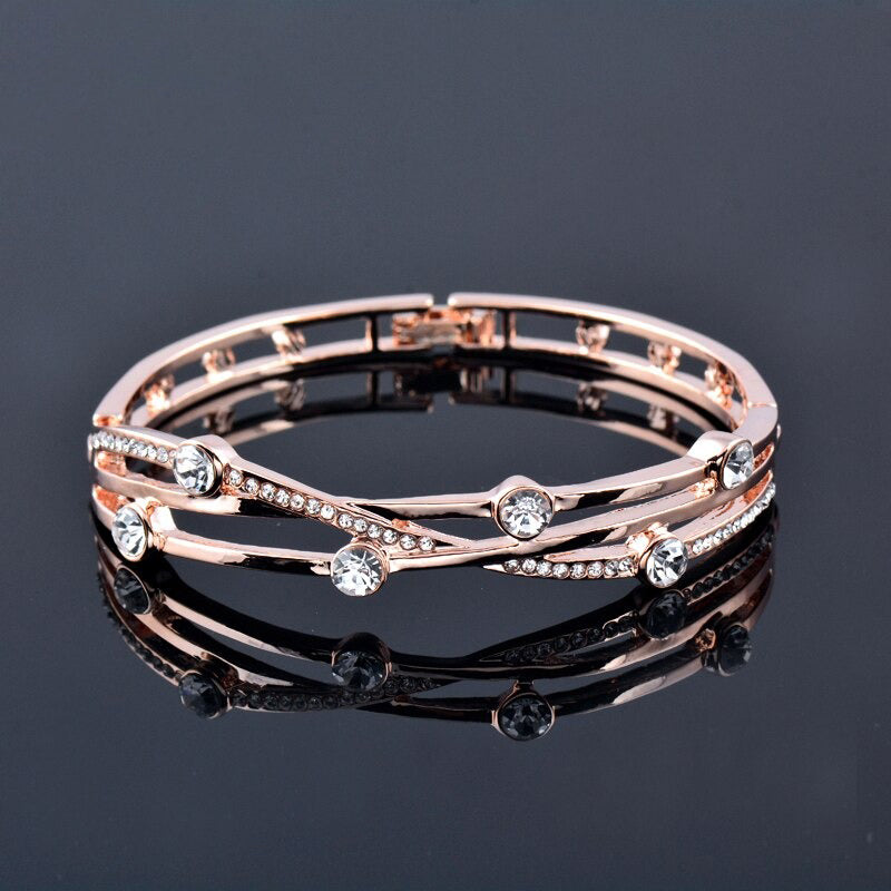 Mit Zirkonen besetzte Armreifen mit hohlen Manschetten