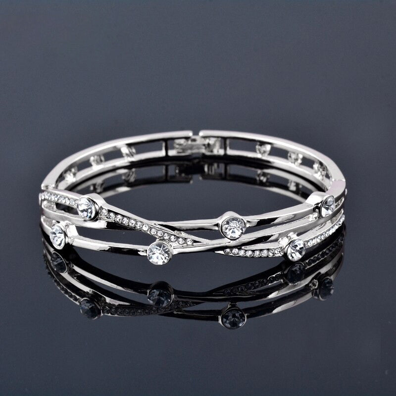 Mit Zirkonen besetzte Armreifen mit hohlen Manschetten