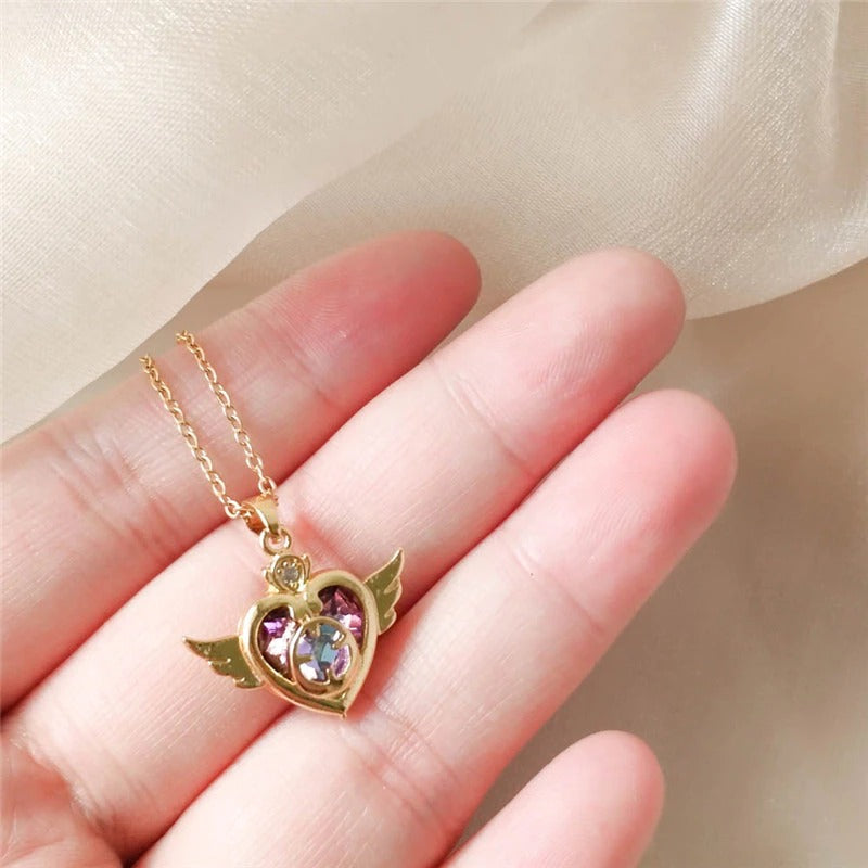 Halsketten mit Zirkonia-Herz und Engelsflügel-Anhänger