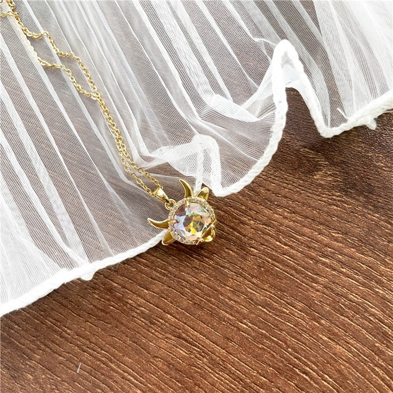 Halsketten mit Zirkonia-Herz und Engelsflügel-Anhänger