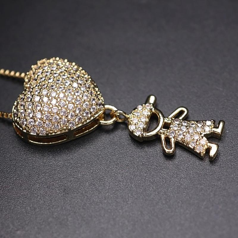 Halskette mit Zirkonia-Herz und Jungen- und Mädchen-Anhänger