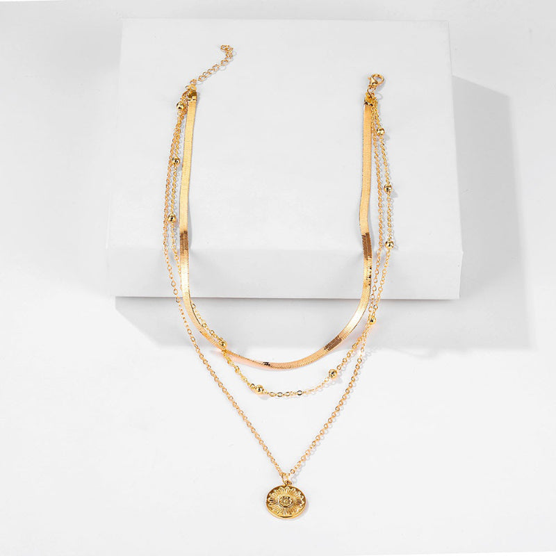 Mehrlagige Boho-Perlenkette mit Münzanhänger-Chokerhalsketten