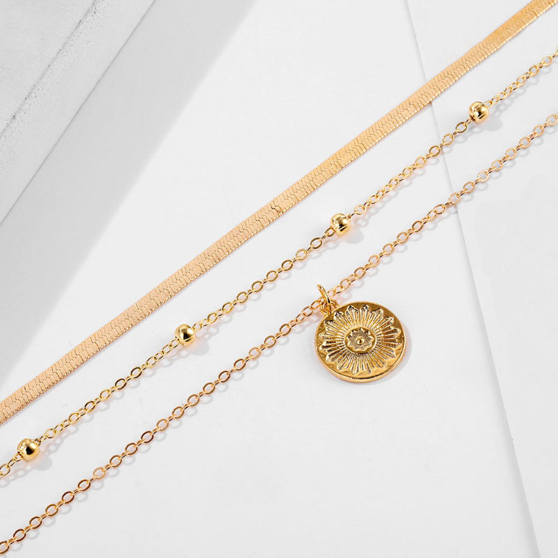 Mehrlagige Boho-Perlenkette mit Münzanhänger-Chokerhalsketten