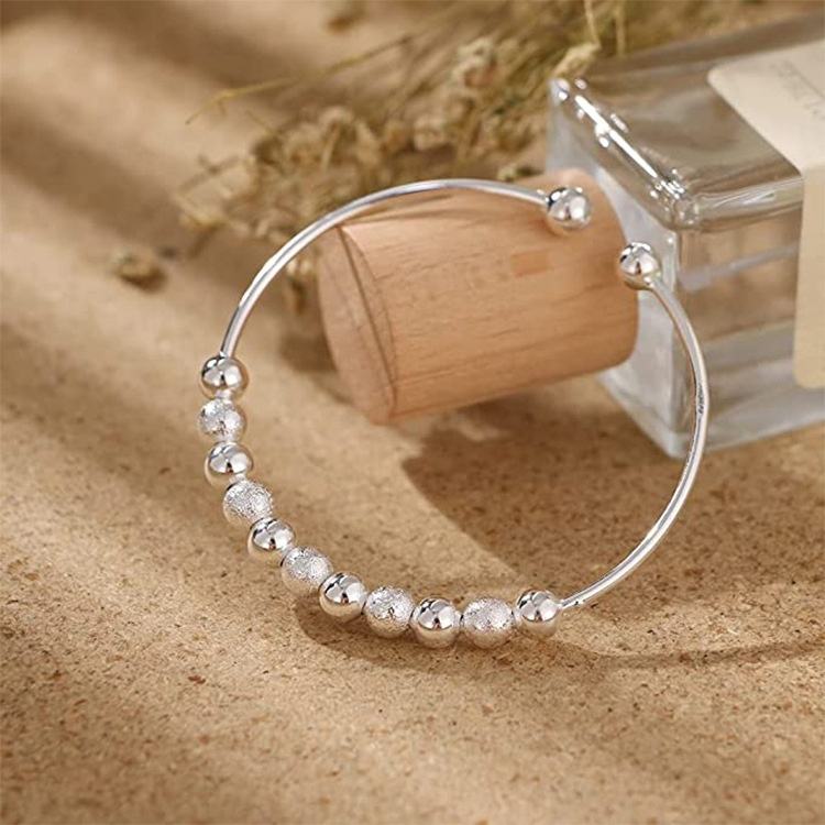 Anti-Angst-Perlen-Dreharmreif