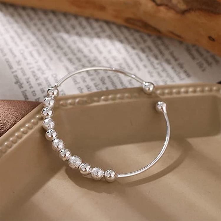 Anti-Angst-Perlen-Dreharmreif