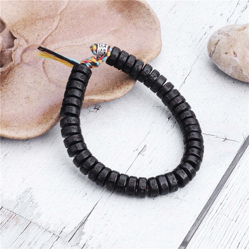 Carmiora tibetische Kokosnussschalen-Perlen mit Gravur Om Mani Padme Hum Mantra Glücksarmband
