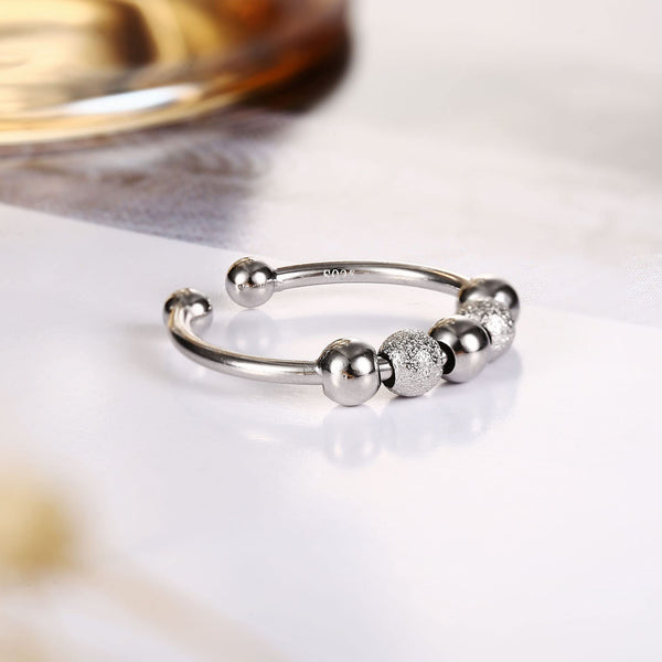 Wunderschöner Ring mit Spinnerperlen zur Stresslinderung